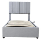 Eenpersoons hydraulisch opbergbed met gestoffeerd gestreept hoofdbord