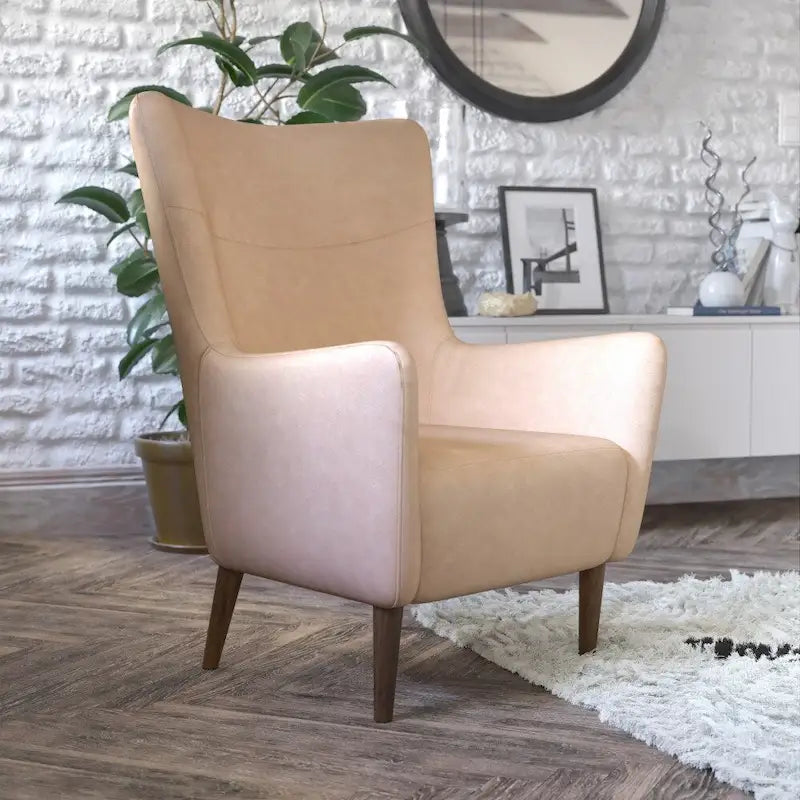 Gestoffeerde oorfauteuil met houten frame en poten