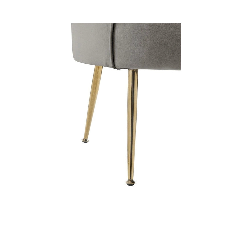 Kuipstoel met geschulpte rugleuning, velours bekleding en metalen poten