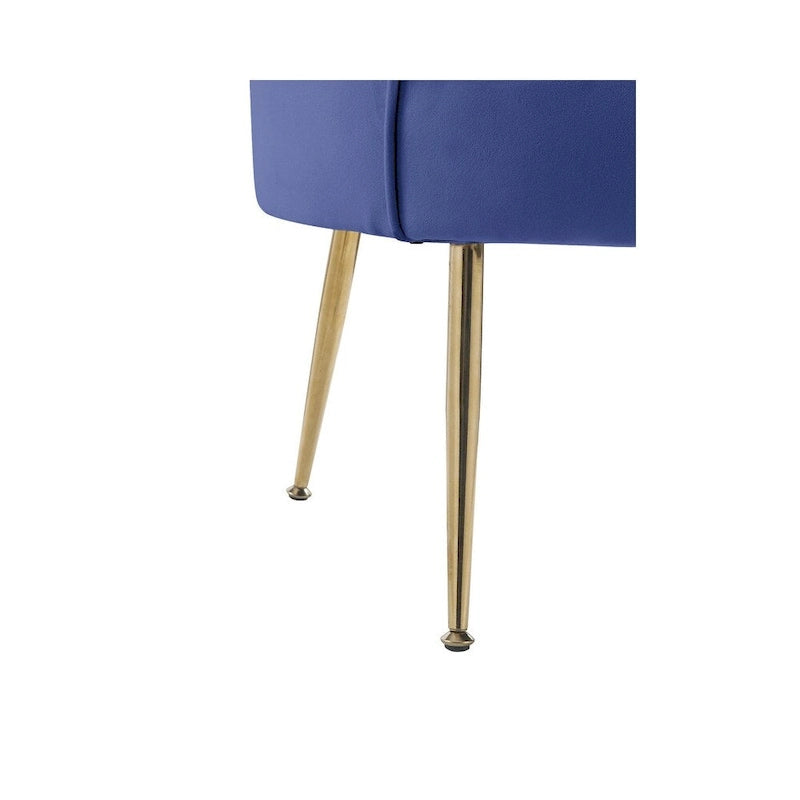 Kuipstoel met geschulpte rugleuning, velours bekleding en metalen poten